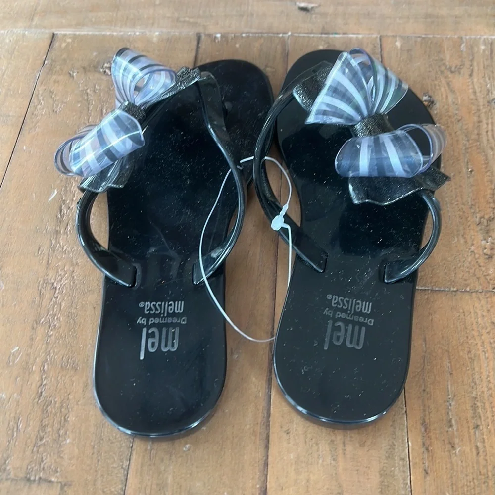 Mini Melissa Mel harmonic black bow flip flop sandals